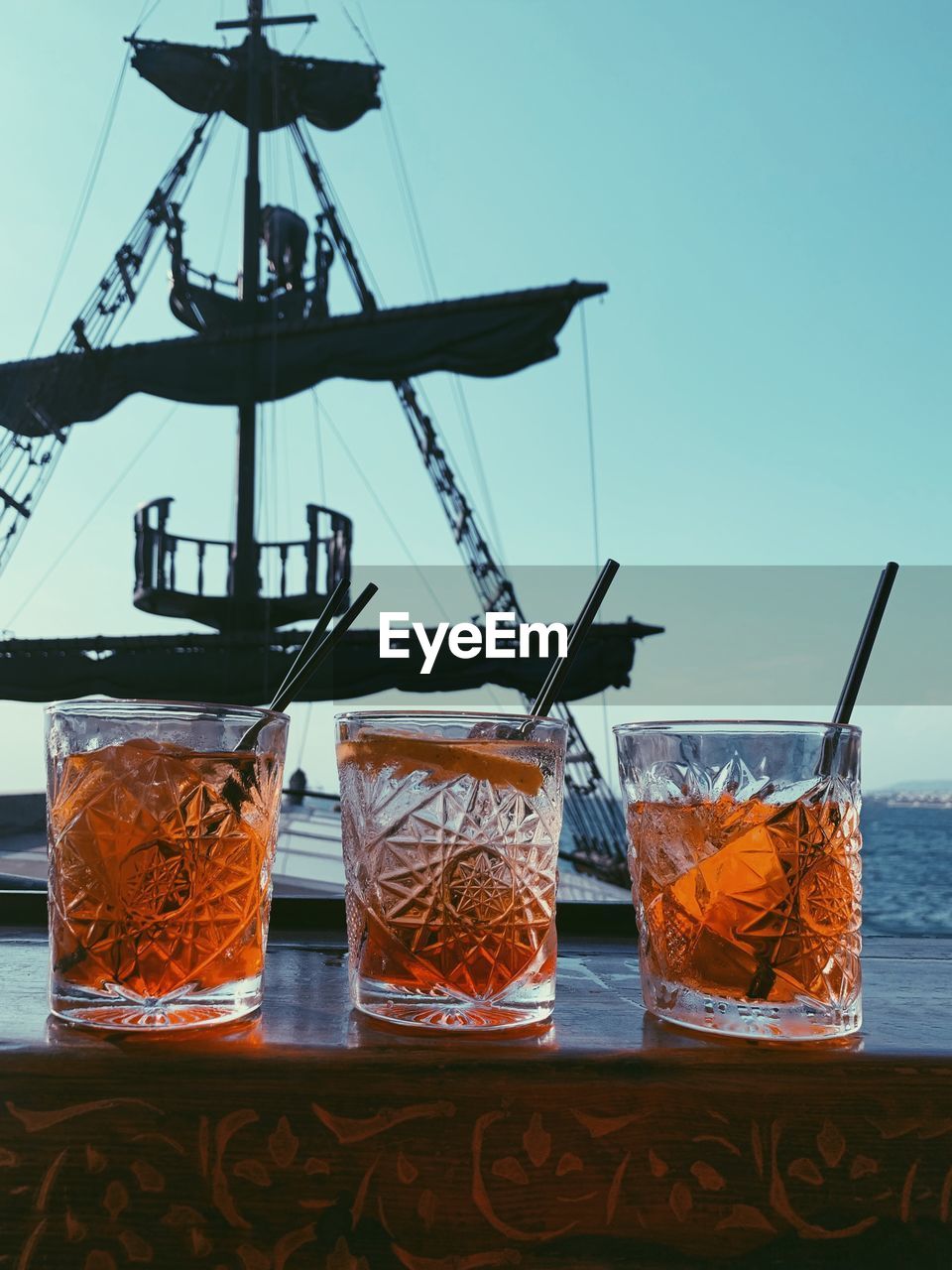 LOW ANGLE VIEW OF DRINK ON TABLE