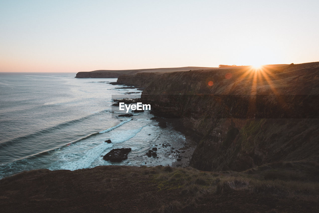 Scenic view of sea against sky during sunset