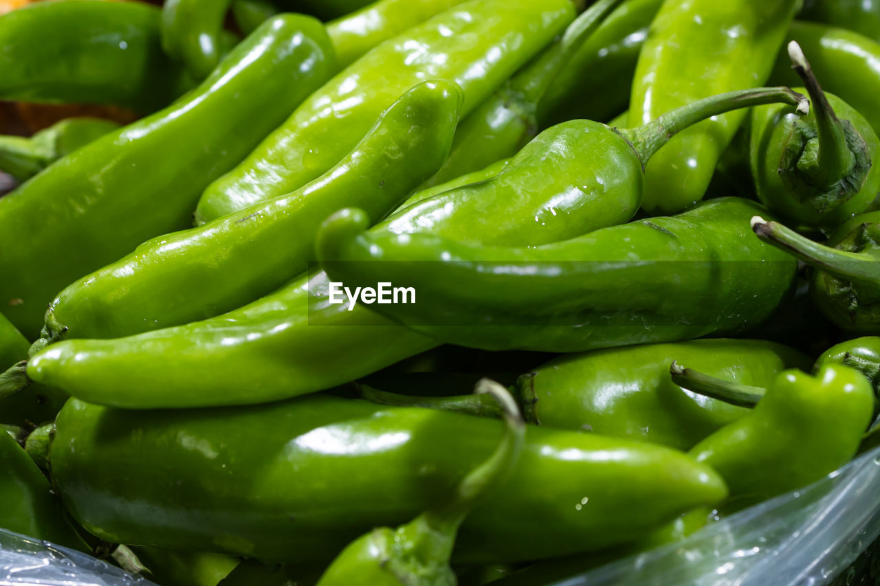 Fresh organic green chilli at vegetable store for sale at evening