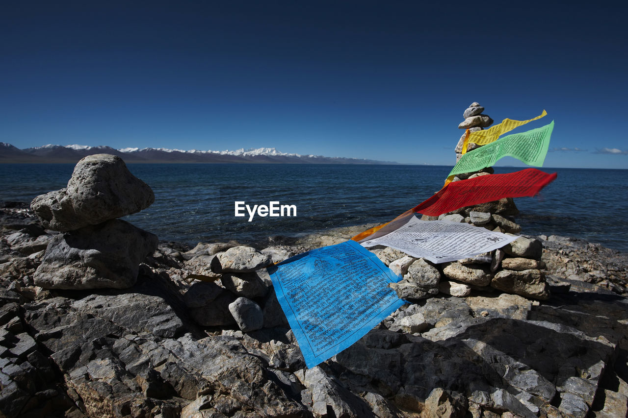 Prayer flags at lake namtso in tibet