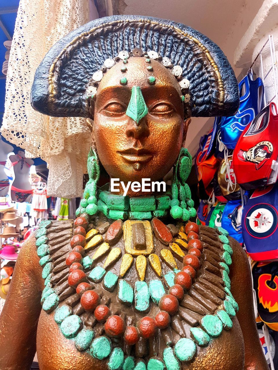 CLOSE-UP OF BUDDHA STATUE