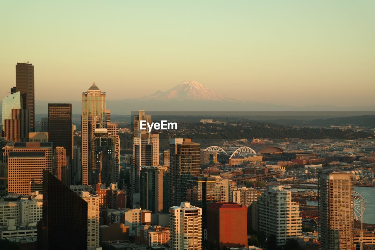 View of cityscape against sky during sunset