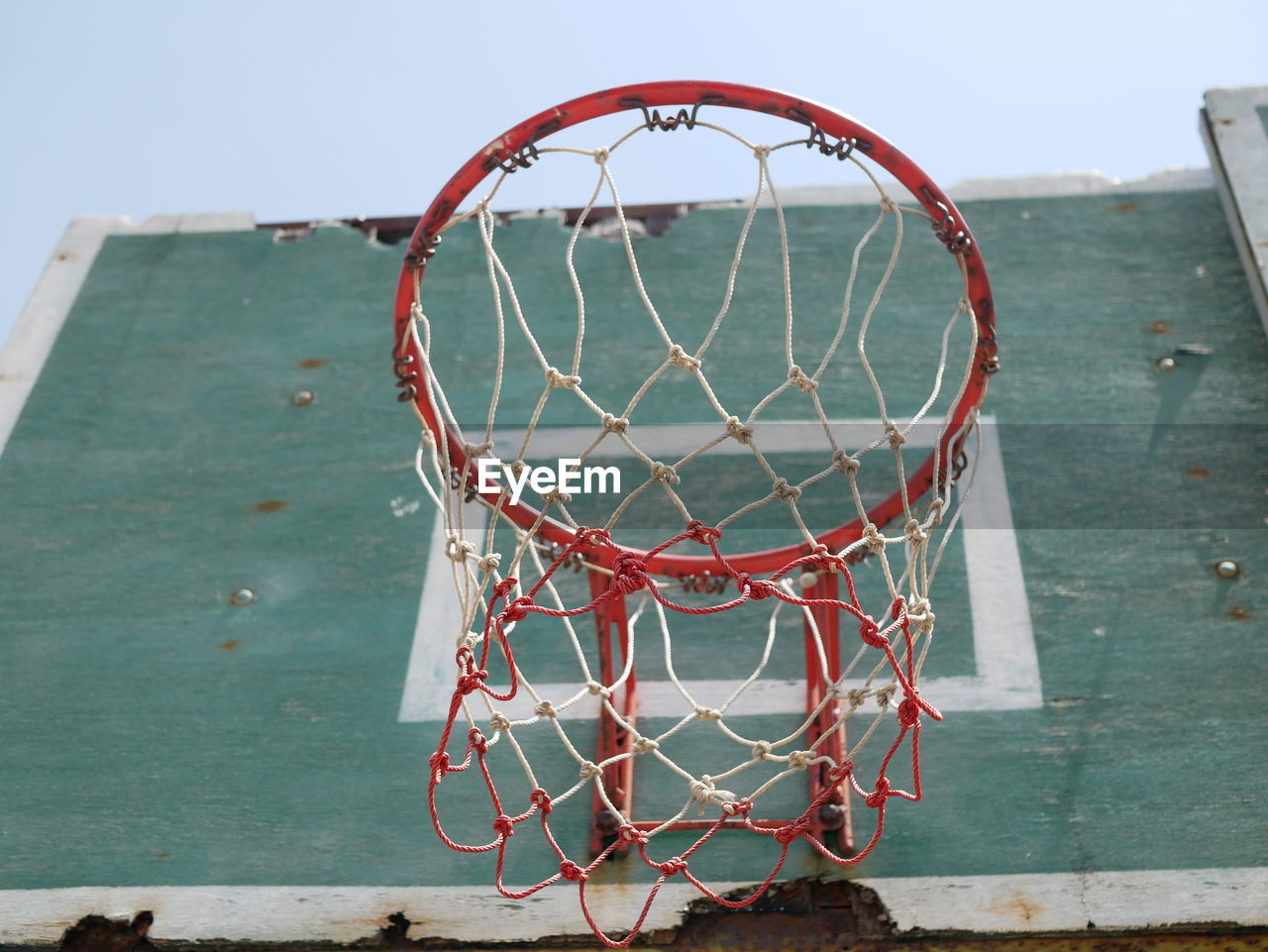 Low angle view of basketball hoop against sky