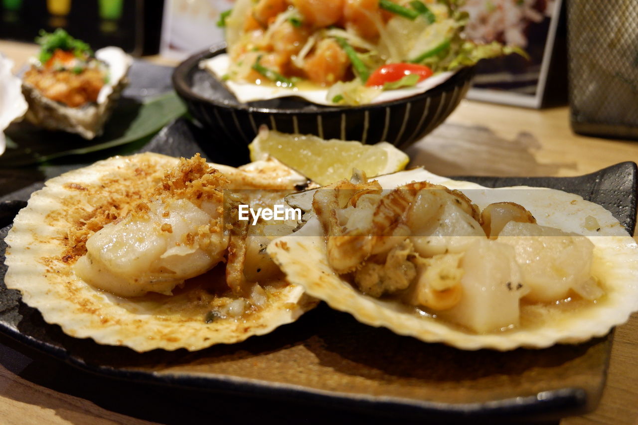 CLOSE-UP OF MEAL SERVED ON TABLE