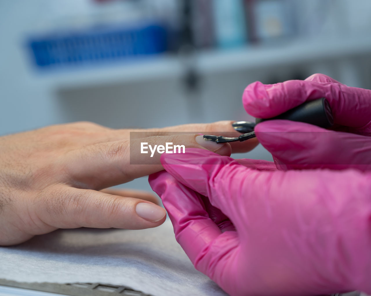 cropped hand of doctor giving medicine