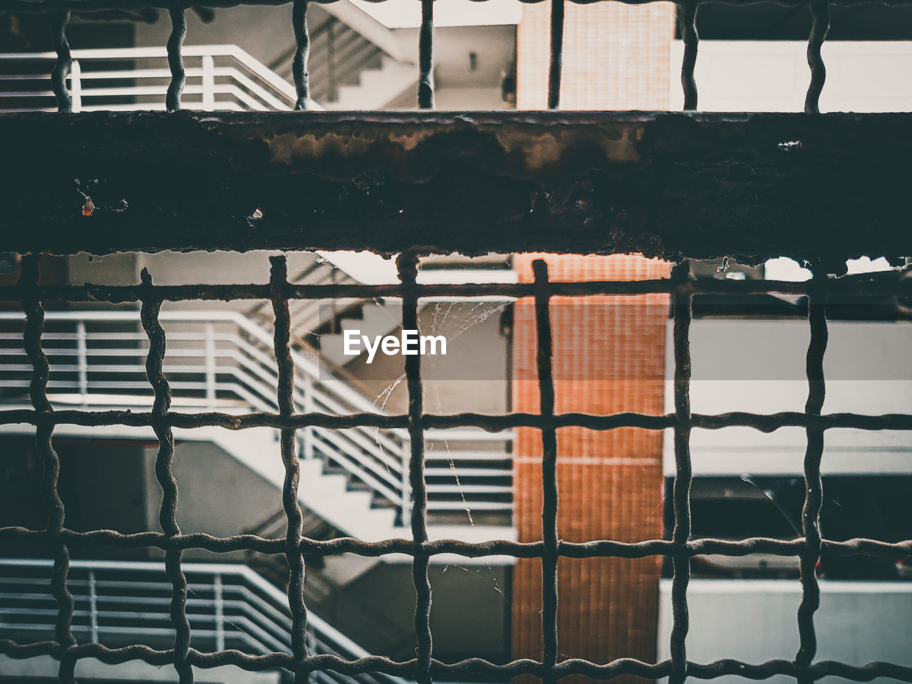 Full frame shot of metal grate on building