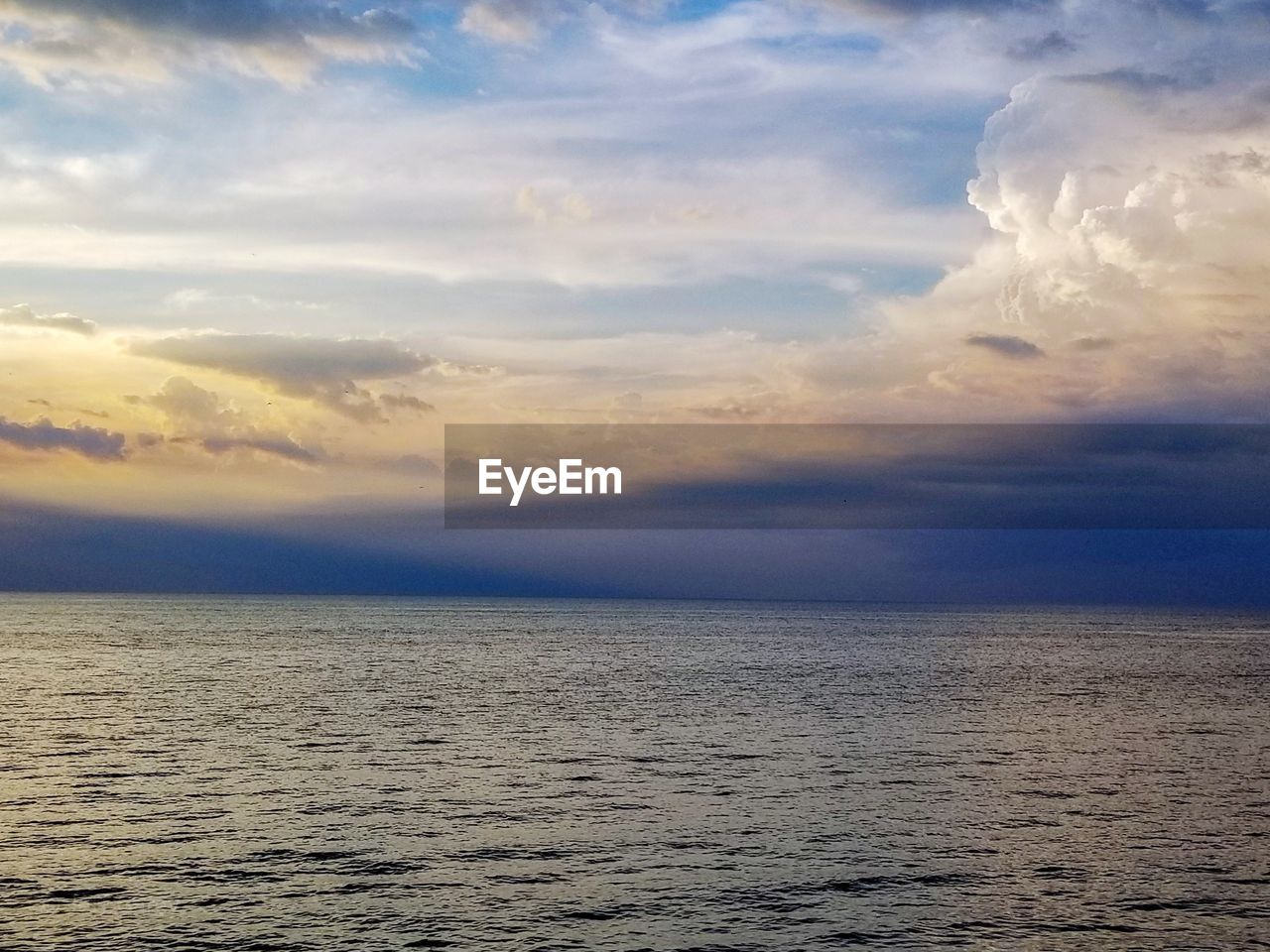 VIEW OF SEA AGAINST SKY DURING SUNSET