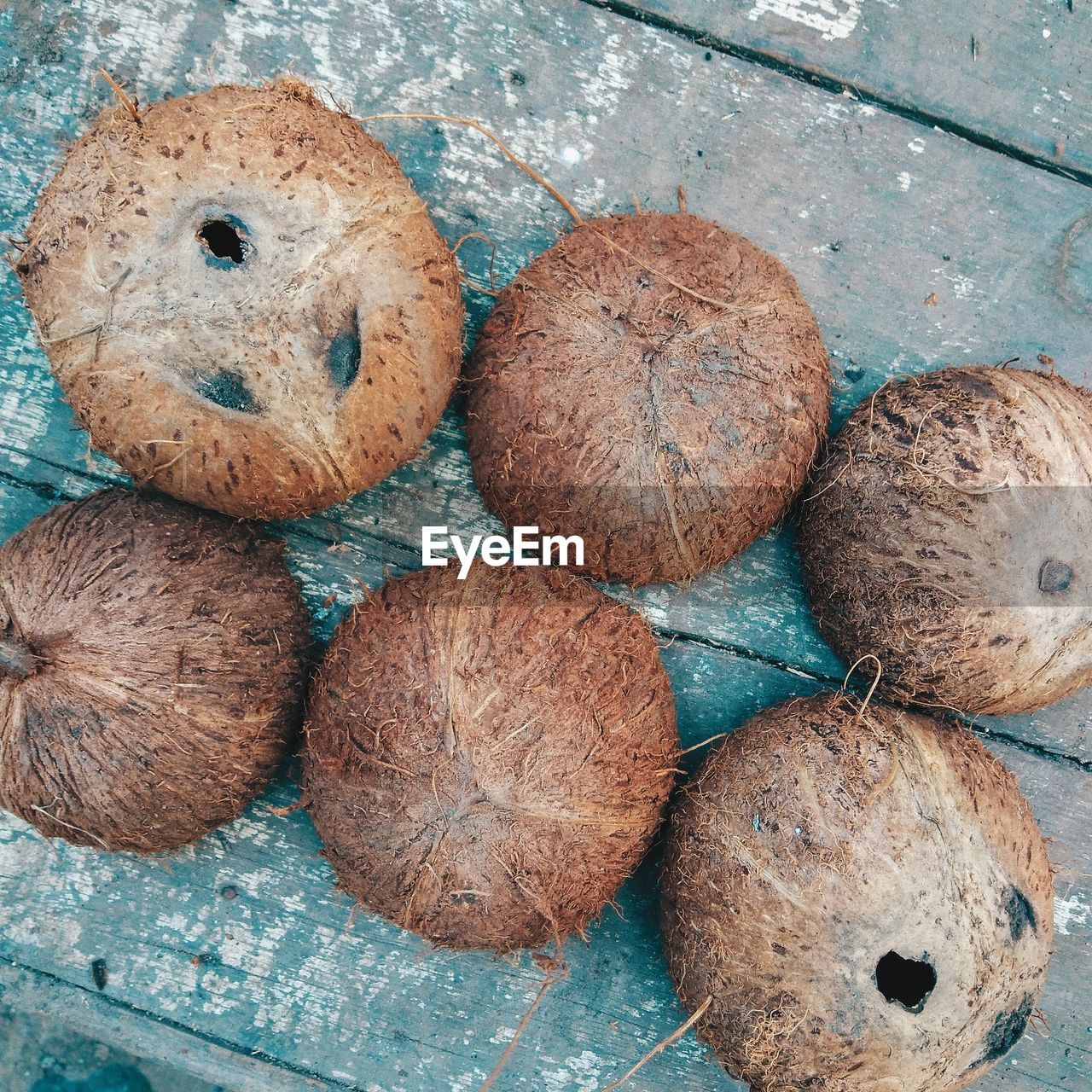 High angle view of coconut shells on table