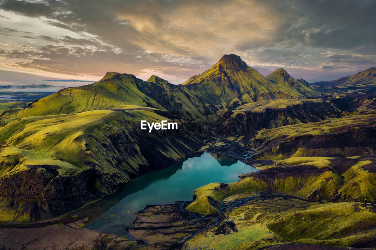 Scenic view of mountains against sky during sunset