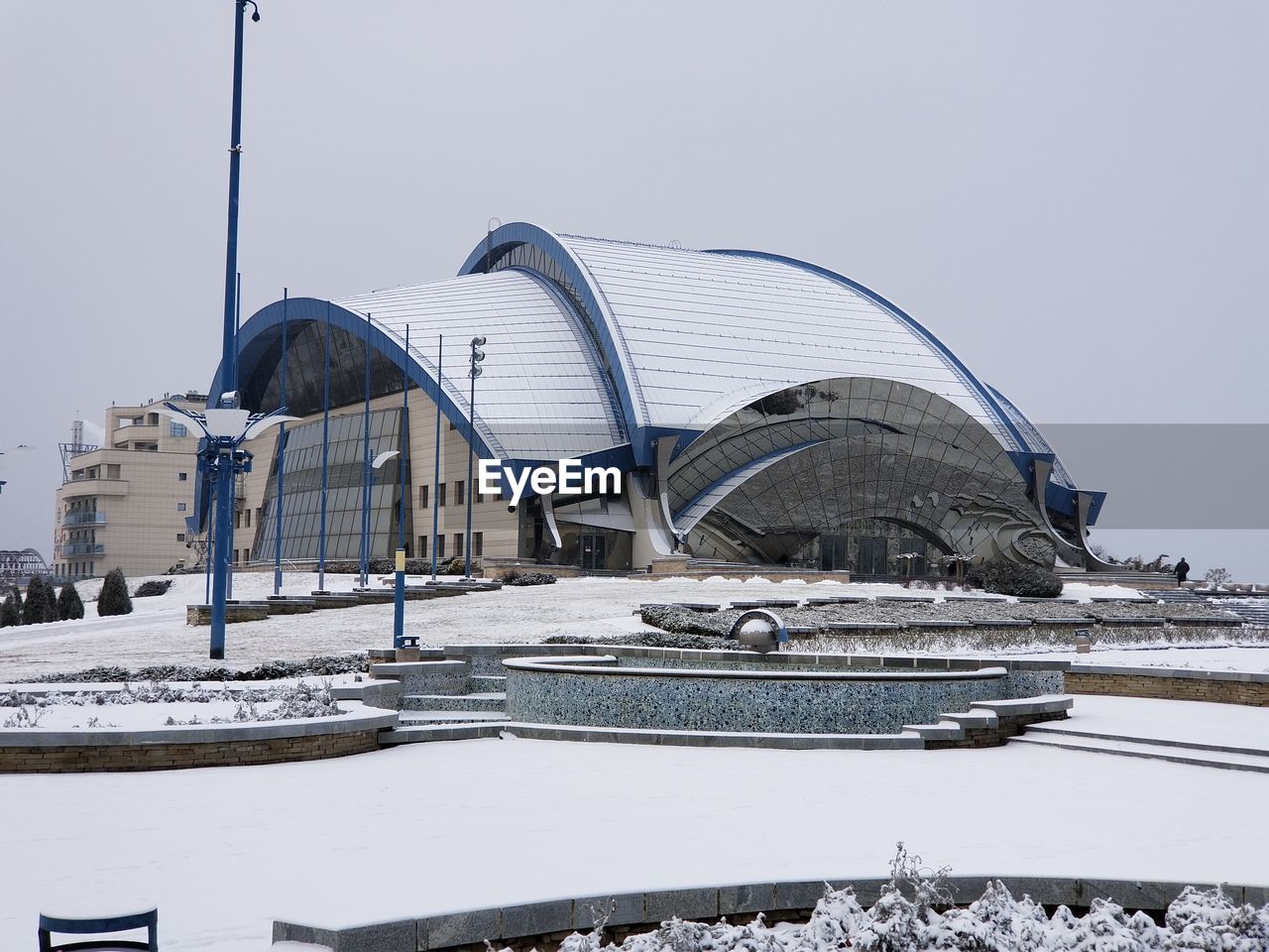 GAZEBO IN WINTER AGAINST SKY