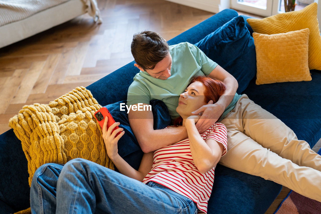 high angle view of woman using mobile phone