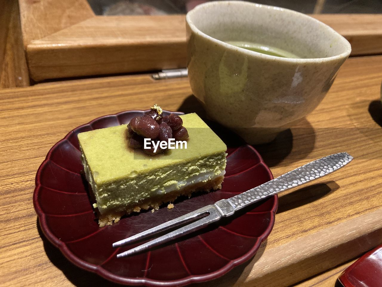food and drink, food, sweet food, dessert, sweet, wood, chocolate, cake, indoors, table, produce, baked, freshness, temptation, kitchen utensil, still life, no people, plate, unhealthy eating, chocolate cake, eating utensil, drink, sweetness
