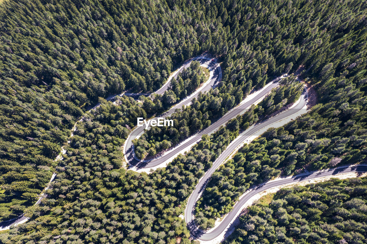 Aerial view from drone of curves of mountain road. transportation and infrastructure concept