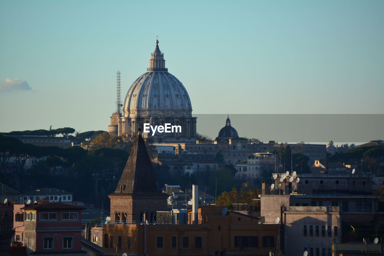 St peter basilica and buildings against sky