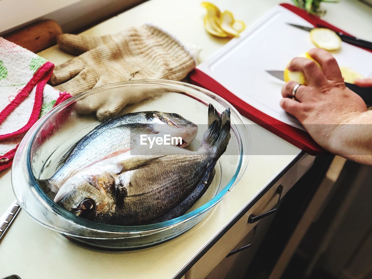 Cropped hand of person preparing food