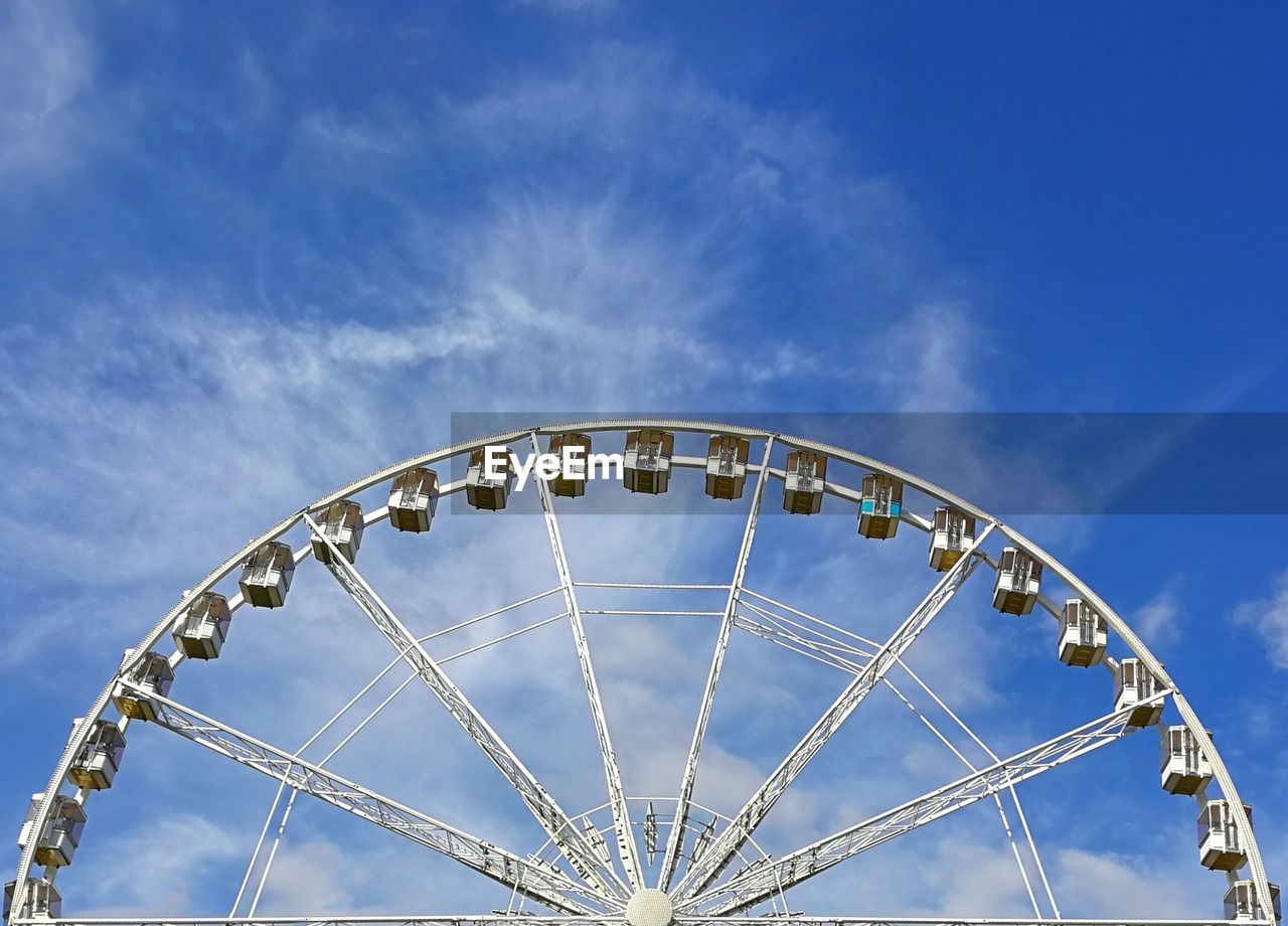 LOW ANGLE VIEW OF FERRIS WHEEL