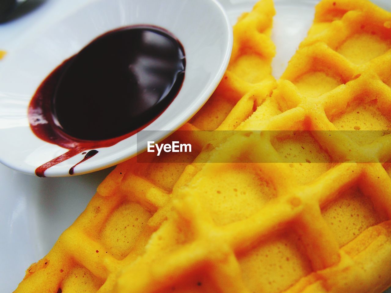 Close-up of waffle with syrup