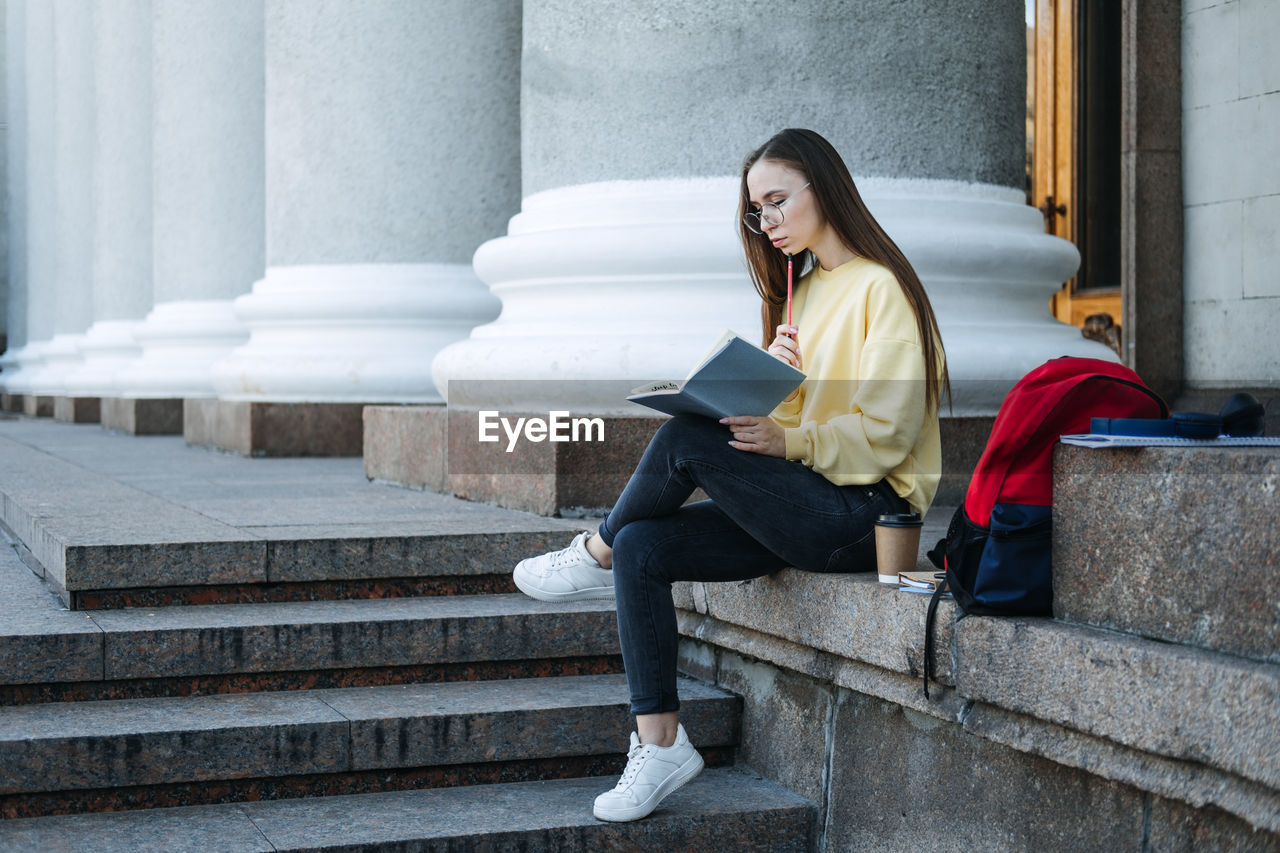 Study tips for back to school, habits of successful students. outdoor portrait of student girl with