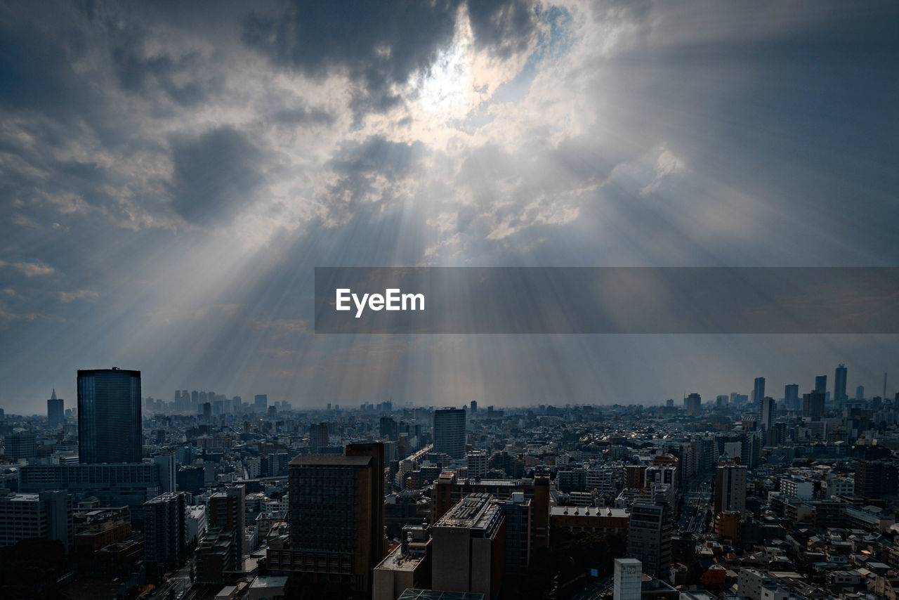 Aerial view of cityscape against sky