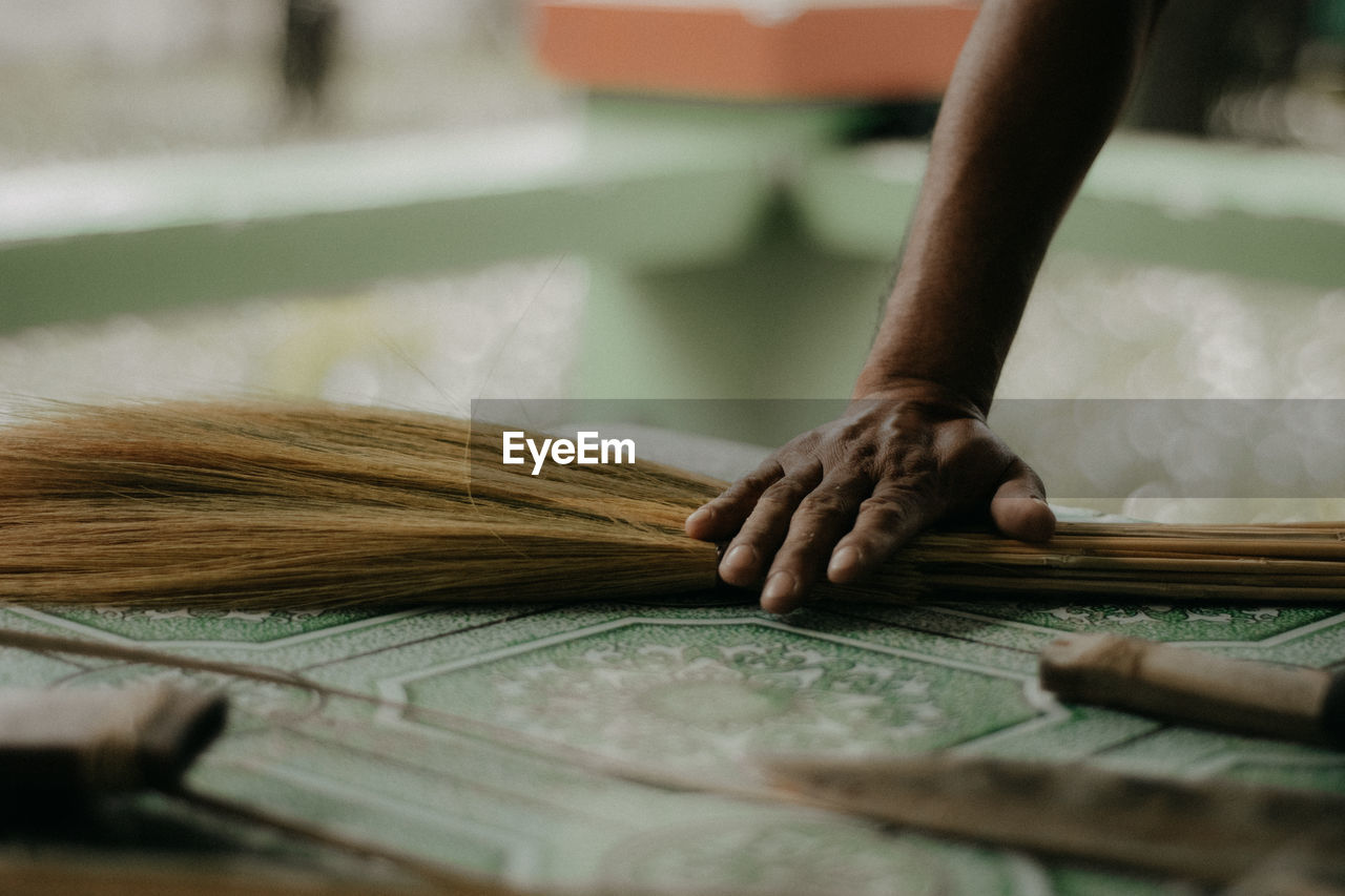 Close-up of man working on table