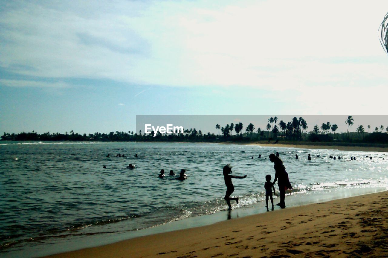 VIEW OF PEOPLE ON BEACH