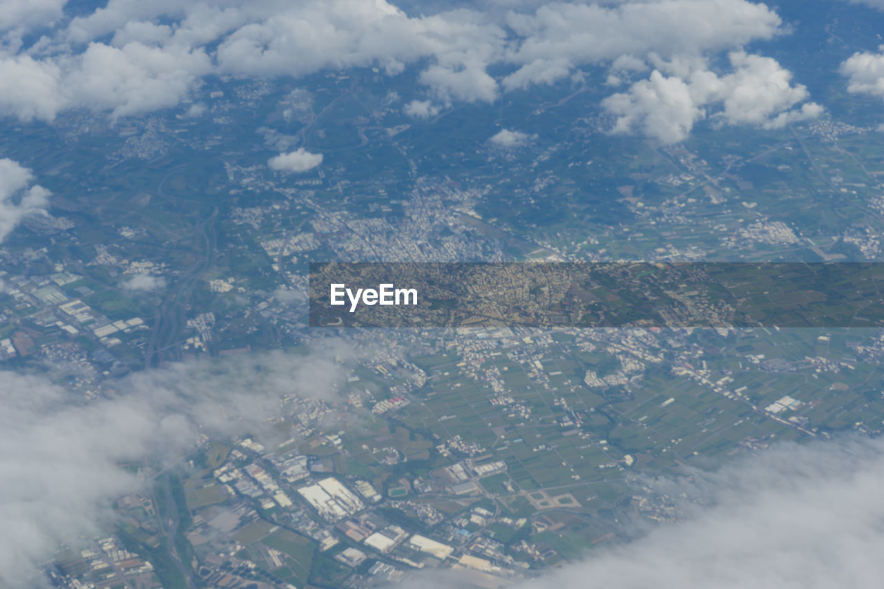 Aerial view of cityscape against sky