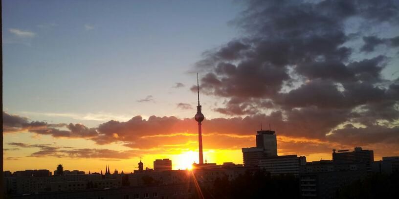 VIEW OF BUILDINGS AT SUNSET