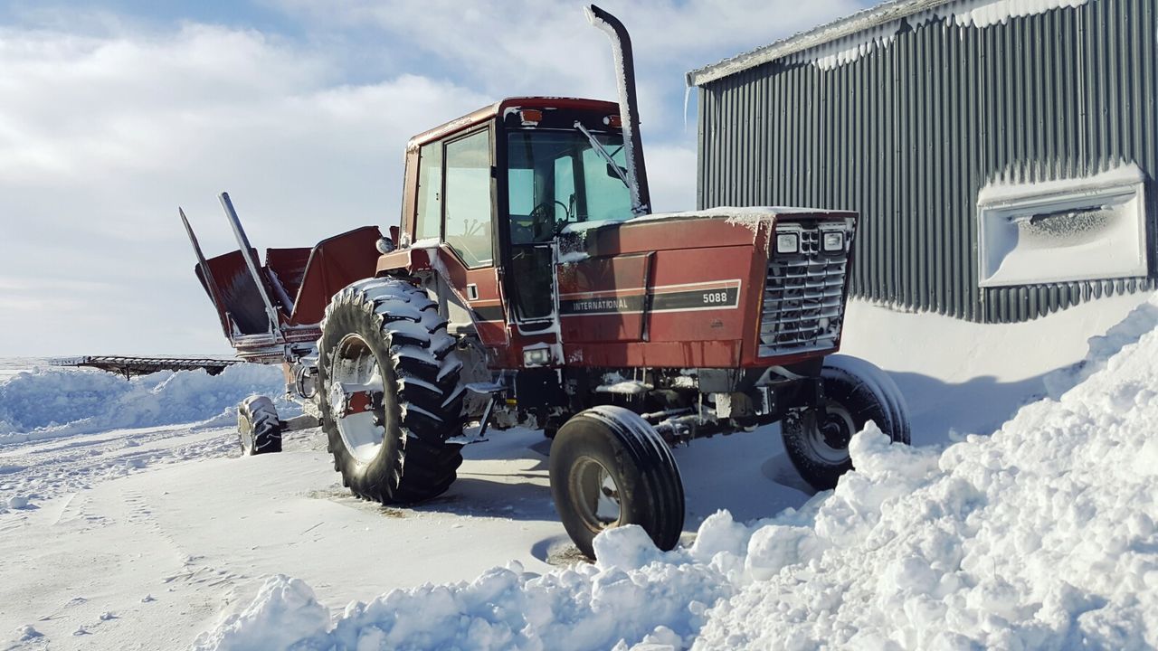 TRACTOR ON SNOW