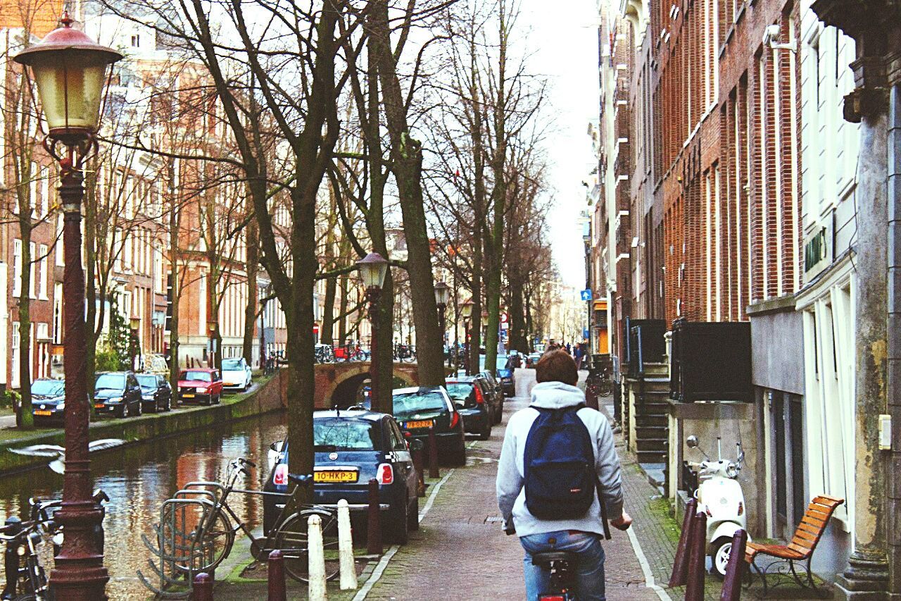 WOMAN WALKING IN CITY