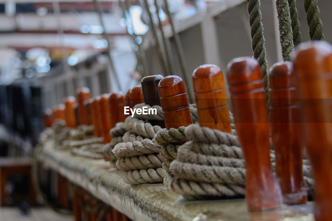 Close-up of ropes on wood