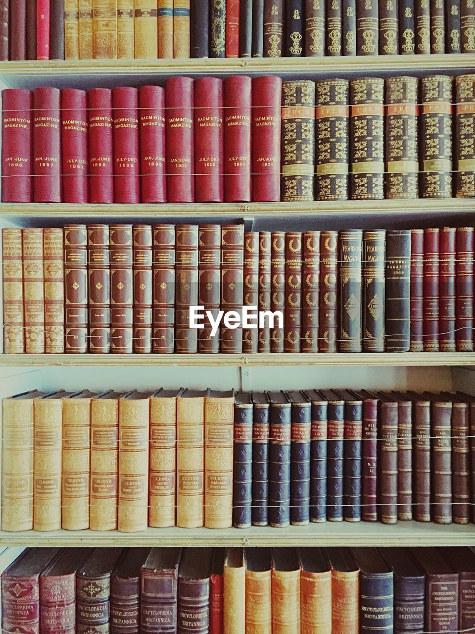 Books line shelf in library