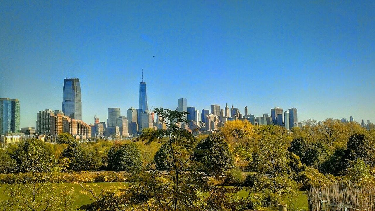 VIEW OF BUILDINGS AGAINST BLUE SKY