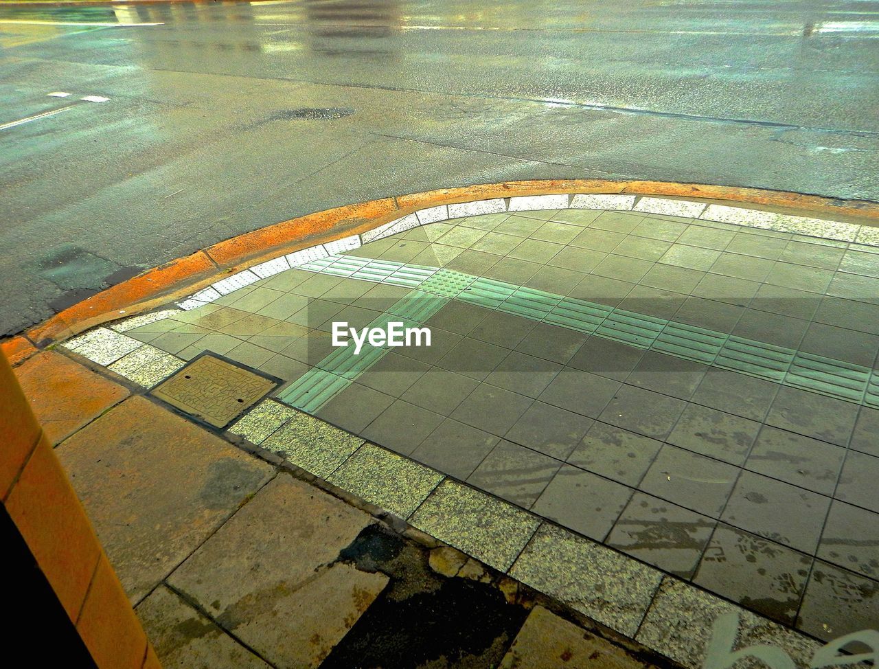 High angle view of wet street during rainy season