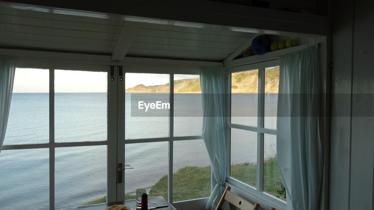 VIEW OF SEA SEEN THROUGH ARCH