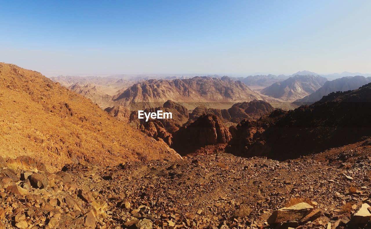 Scenic view of mountains against clear sky
