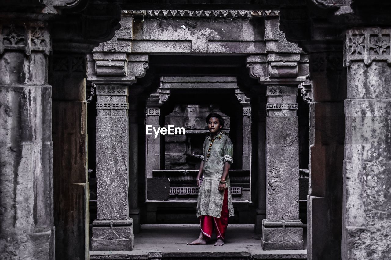 Portrait of man standing in temple