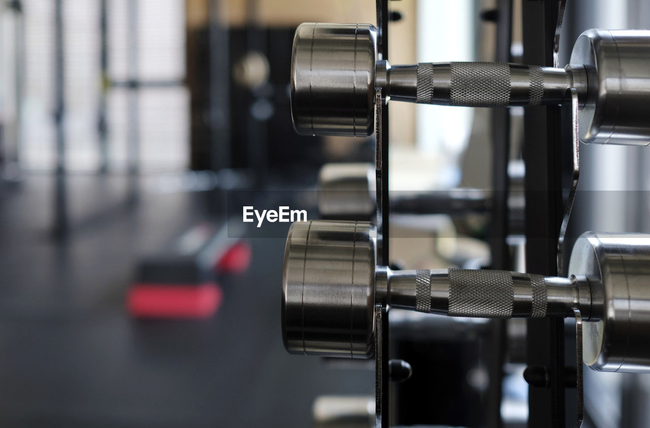 room, technology, equipment, indoors, industry, sport venue, metal, close-up, business, machinery, factory, no people, focus on foreground, manufacturing equipment