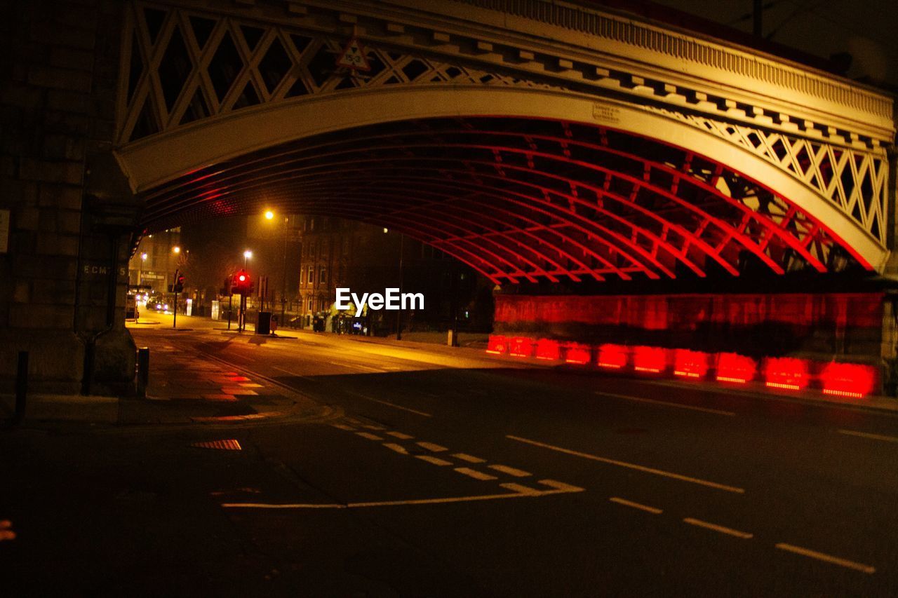 ILLUMINATED BRIDGE AGAINST SKY