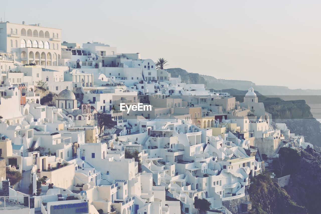 HIGH ANGLE VIEW OF BUILDINGS AGAINST SKY