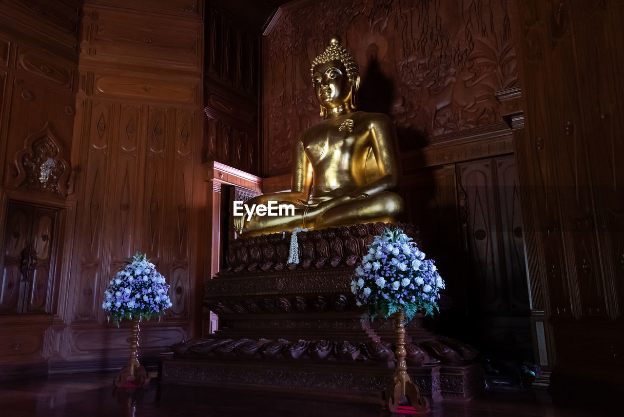 Low angle view of sitting buddha