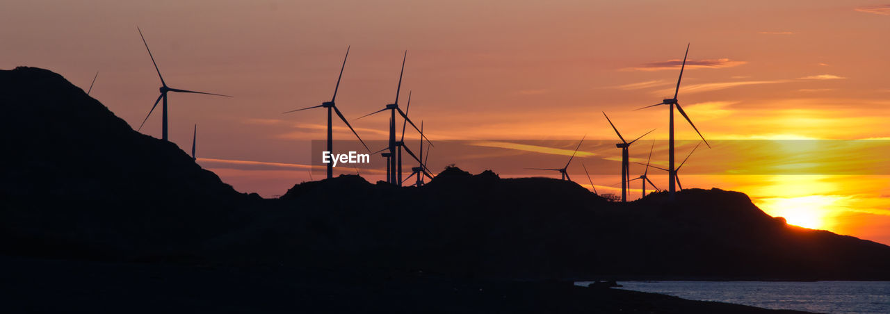 Scenic view of landscape against sky during sunset