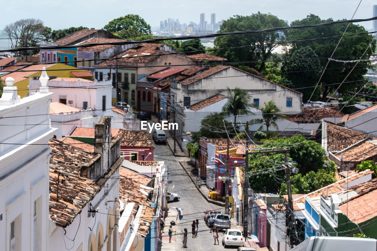 High angle view of houses and buildings in city