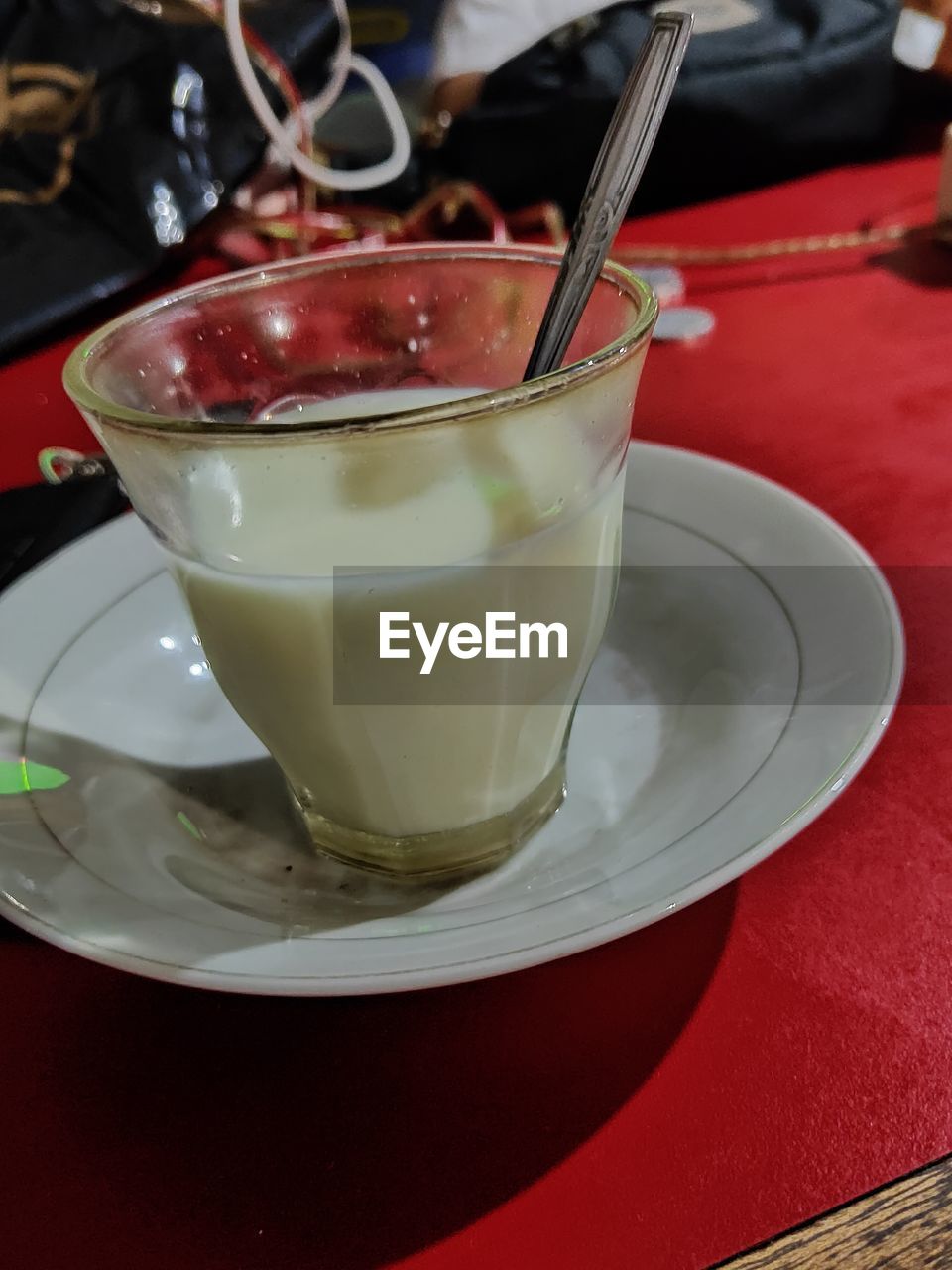 CLOSE-UP OF DRINK IN GLASS