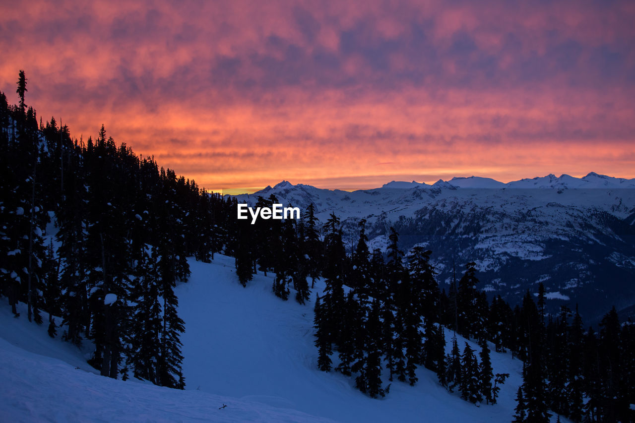 Sunset in winter on mountain in canada