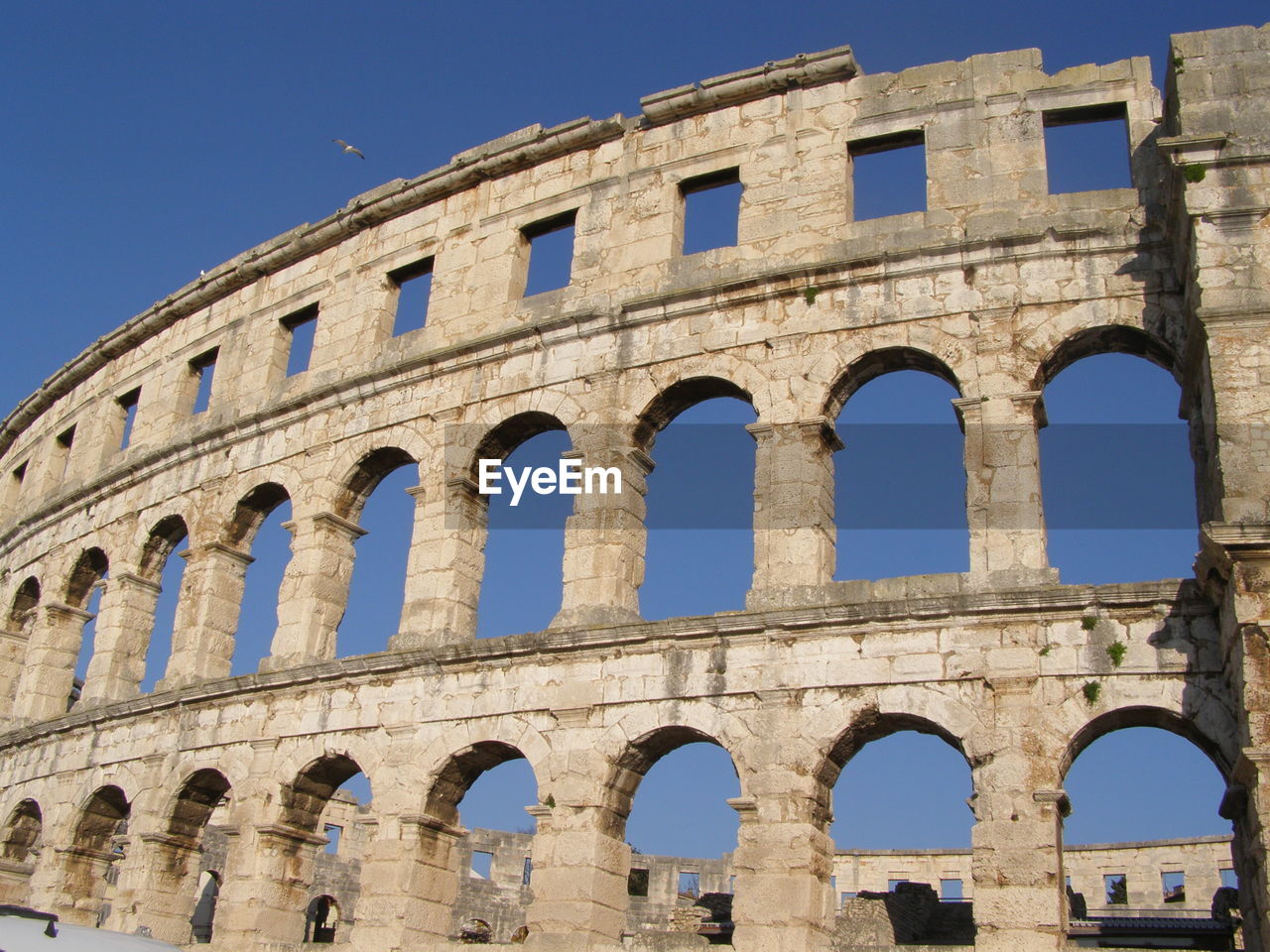 Low angle view of historical building against clear sky