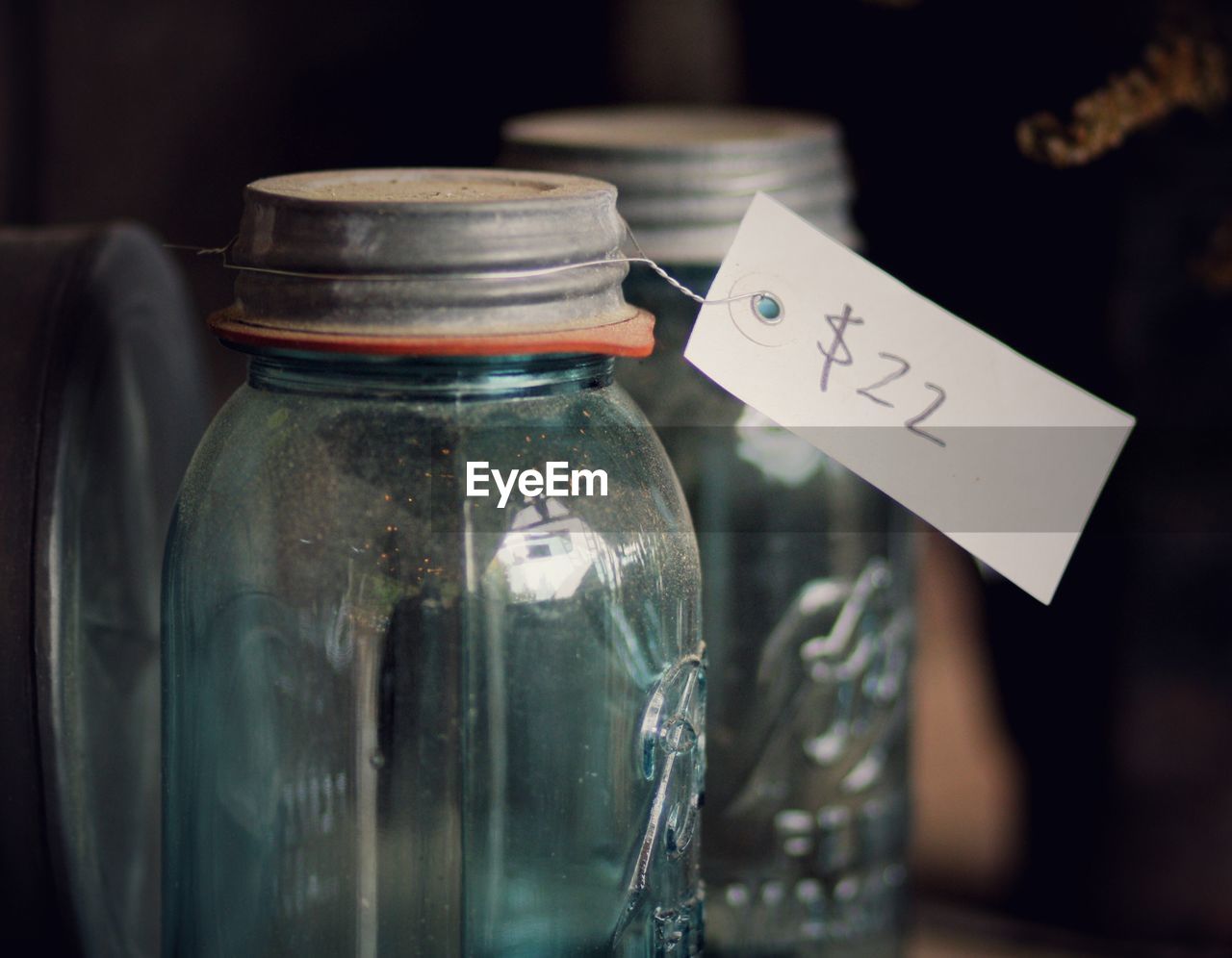 Close-up of glass jar on table