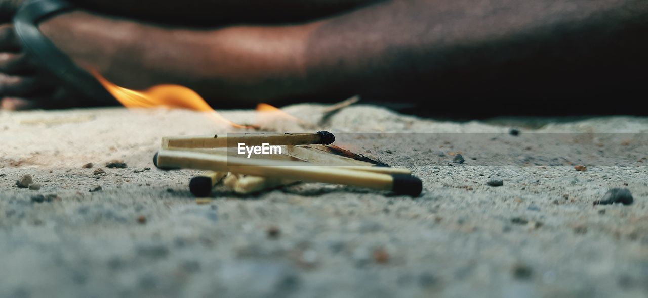 Close-up of person smoking cigarette