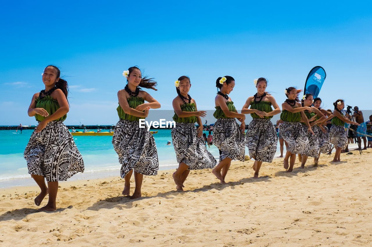 VIEW OF PEOPLE ON BEACH