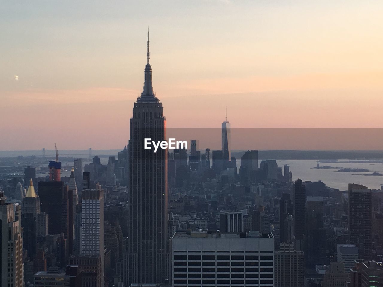 View of cityscape against sky during sunset