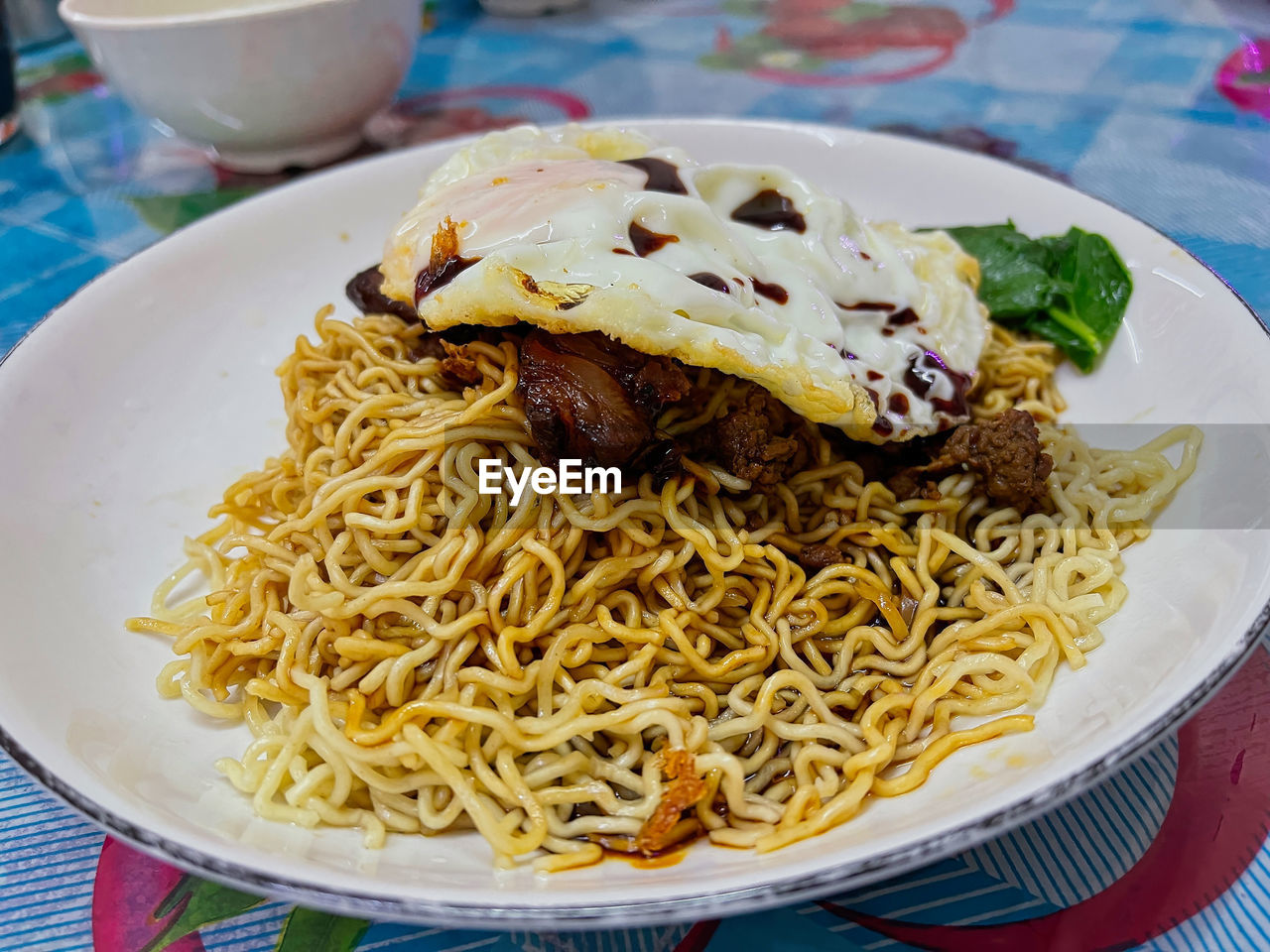 food, food and drink, pasta, italian food, plate, dish, spaghetti, cuisine, freshness, healthy eating, fried noodles, no people, meal, indoors, table, chow mein, wellbeing, close-up, meat, tableware, produce, serving size, crockery, noodle, vegetable, asian food